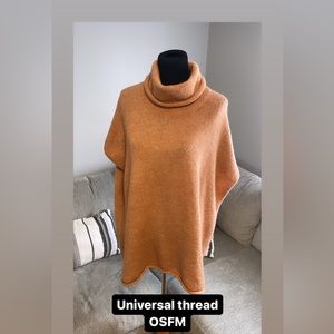 Pale orange sweater cape